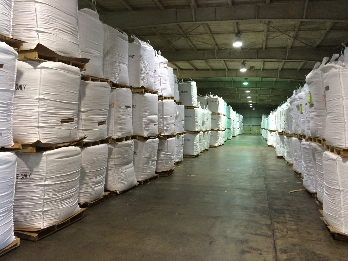 Image of bulk bags stored in a warehouse.