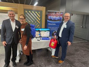 David Fischer (FPS), Connie Cheren (Partners for Care) and Tony Black (FPS) showcase the use of the WaterSafe.